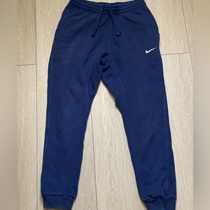 Navy bleu nike sweats with back button pocket
